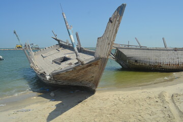 Detail and closeup of old and colored boat wooden hull, 
