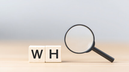 Question analysis magnifying glass wooden block letter WH why concept discovery search symbol