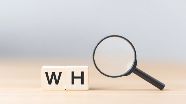 Question analysis magnifying glass wooden block letter WH why concept discovery search symbol