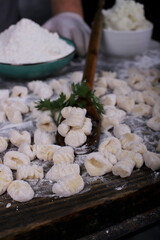 chef preparing gnocchi by hand in the traditional way