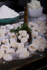 chef preparing gnocchi by hand in the traditional way