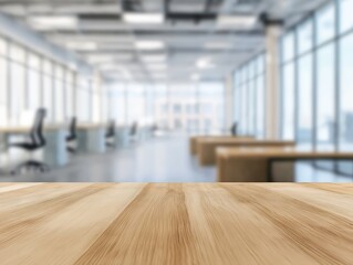 Wooden table surface presenting copy space with blurred contemporary open plan office interior featuring desks and chairs