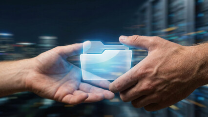 Hands passing glowing digital folder icon in data center transfer concept with warm emotion