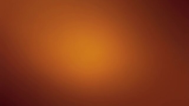 A warm orange glow emanates from the center of a dark reddish-brown background viewed straight on