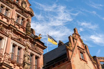 Heidelberg Castle Friedrich Wing Flag.The Baden Wurttemberg flag over the Friedrich Wing main baroque facade of Heidelberg Castle Baden Wurttemberg.
