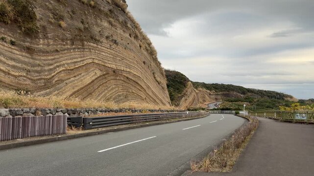 Folded Strata Road Cut and Rock Outcrop on Izu Oshima Island, Japan
