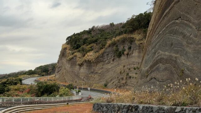 Folded Strata Road Cut and Rock Outcrop on Izu Oshima Island, Japan
