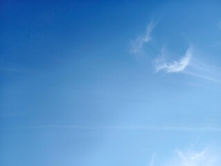 The sky is clear with a few clouds.