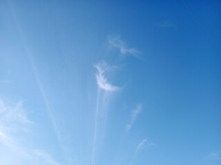 The sky is clear with a few clouds.