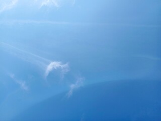 The sky is clear with a few clouds.