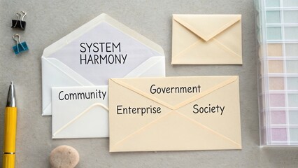 Envelopes with Words Representing Community, Government, Enterprise, Society, and Harmony on a Desk with Office Supplies