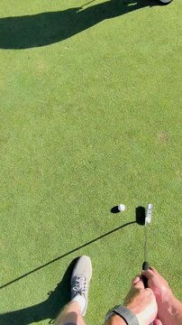 Golfer Missing Short Putt on Sunny Green from POV Viewpoint