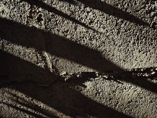 Light and shadow on the wall surface.