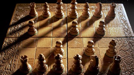 Overhead shot of chess game with wooden pieces on board, strategy and competition concept, closeup game - Powered by Adobe