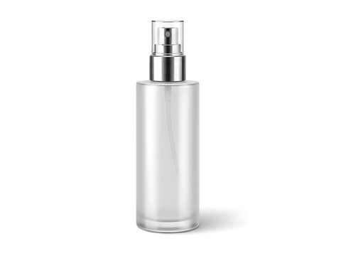 Clear frosted glass spray bottle with a metallic silver cap, a cosmetic container isolated on a white background
