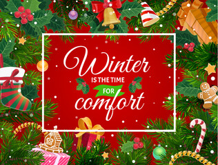 Fototapeta premium Christmas greeting card with pine tree decorations holly berry gifts and winter is the time for comfort quote, surrounded by festive fir branches, baubles, candy cane, gingerbread on snowy background