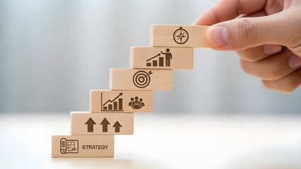 hand holding blocks with word helpHand holding wooden blocks spelling HELP symbolizes support, care and teamwork, representing kindness, guidance and human assistance for solving problems, building tr