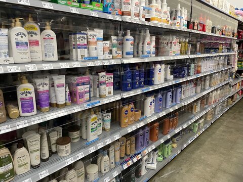 Walmart retail store Skin care security glass section side view