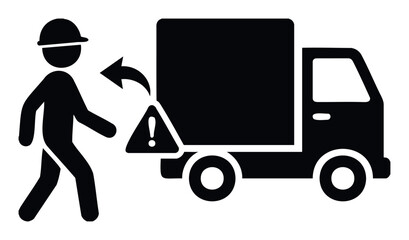 Worker in helmet approaching a truck with a warning sign to signal hazard during delivery or transport operations
