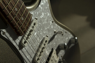 This is a close-up of the electric guitar strings.