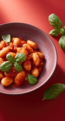 Pasta dish with tomato sauce and basil