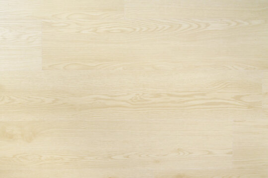 Seamless light-colored wood grain flooring