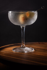 High contrast image of a vodka martini served up and chilled.