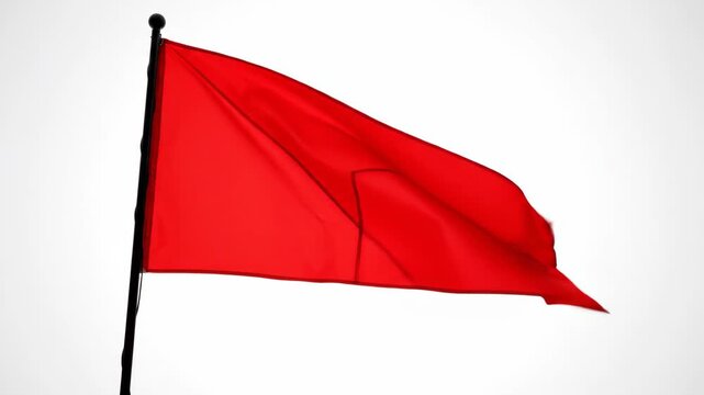 Red Flag Waving on Pole - A bright red flag waves gently on a black flagpole. The background is a clean white, simple and clear.
