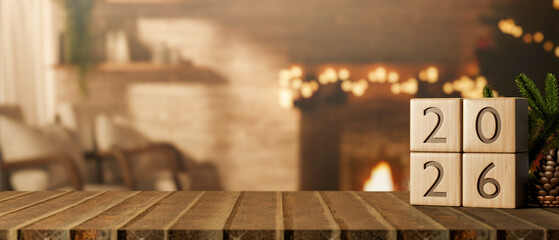 Obraz premium 2026 new year wooden blocks calendar on table across fireplace and bricks wall with Christmas tree.