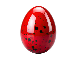 Glossy red egg with black speckles, isolated on a black background