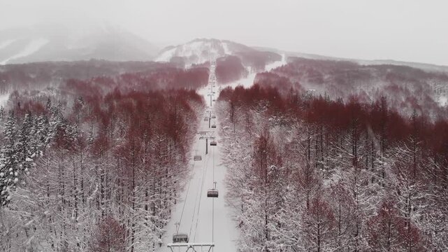Aerial Panorama of Cable Car ride, snowed Mount Iwaki Japan in Winter landscape