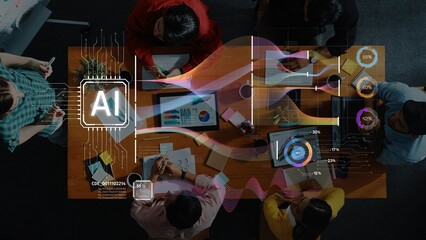 Engaging aerial view showcasing a diverse team collaborating on an AI-driven project in a modern office. Digital graphics enhance the workspace environment. Raster