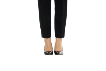 Female legs in black pants on a white surface, PNG