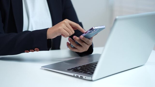 Business people working with smart phones with laptop computers with social media layouts.