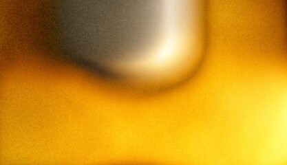 Abstract golden metallic texture with soft grainy light reflections