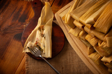 Tamales. Traditional dish typical of Mexico and some Latin American countries. Corn dough wrapped in corn leaves. The tamales are steamed.