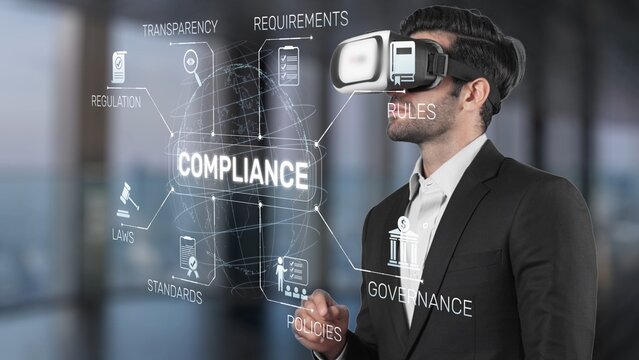 A businessman engages with virtual reality technology for training on compliance and regulations in a modern office setting, emphasizing governance and policies. Raster