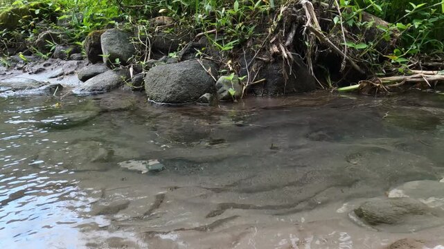 water flowing into the river, Java, Indonesia, South East Asia