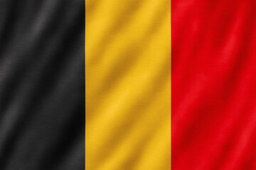 Naklejka premium Realistic Belgium Flag with Vertical Black Yellow Red Stripes on Waving Fabric