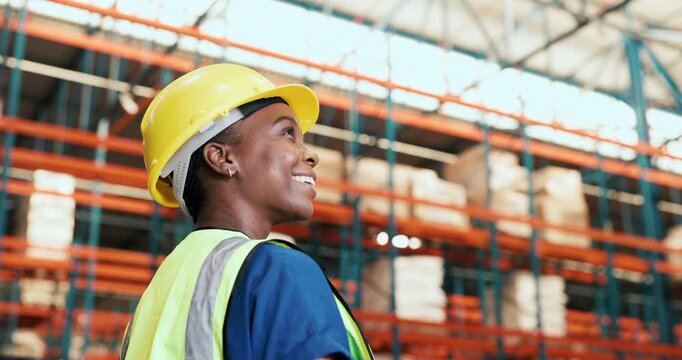 Logistics, black woman and smile with inspection in warehouse for transport, backlog control or delivery. Low angle, shipping and supplier for inventory export, cargo management or supply chain