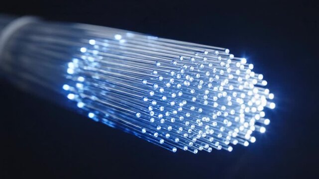 Macro Fiber Optic Cable Tips Glowing with Data Light