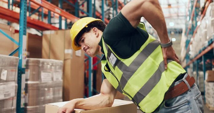 Logistics, back pain or man in warehouse with accident, spinal massage or emergency in supply chain. Ache, flare or loader in depot with injury, muscle strain or osteoarthritis in distribution.