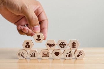 A woman holding a puzzle piece of a toy house over a piggy bank on the floor represents a successful business finance and home investment savings concept