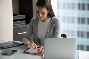 Modern tech for office communication. Busy millennial woman ceo boss project coordinator use...