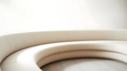 contrapositive. A minimalist, flowing arc of upholstered seating on a blurred neutral background. real-estate listings.