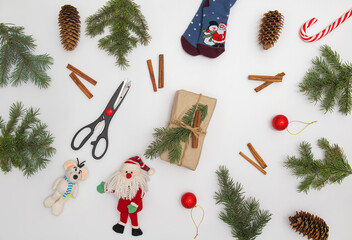 Christmas flat lay styled scene with evergreen fir tree, decorations