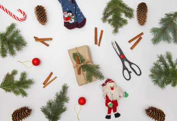 Christmas flat lay styled scene with evergreen fir tree, decorations