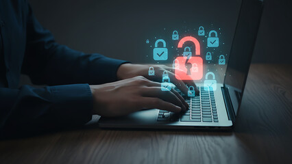 Cybersecurity concept showing person using laptop computer with digital padlock icons, highlighting data protection, secure access, privacy risk prevention, online security awareness. Cybersecurity /