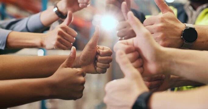 Team, thumbs up and hands of people in warehouse for shipping, distribution and logistics business. Supply chain, factory and men and women with emoji for quality control, approval and collaboration