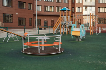 Modern playground for children in courtyard. Exercise equipment